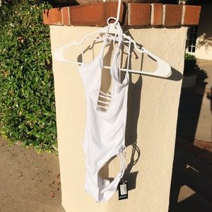 New Plunge and cutart strappy one piece swimsuit